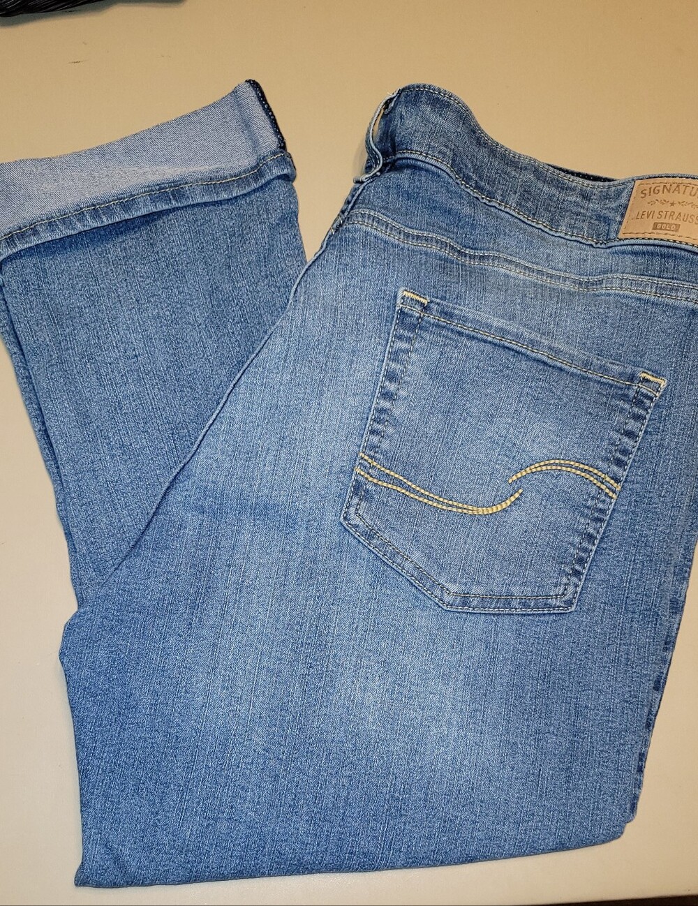 Levi's Women's Light Blue Cuffed Capri Jeans.